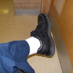 Oops! Someone forgot about the "no white socks" rule.