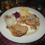 Clockwise form the top: spaetzle, rouladen, sauerbraten, mashed potatoes, and clove flavored red cabbage
