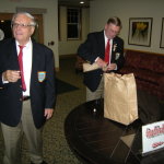 President Bill greets the arriving singers
