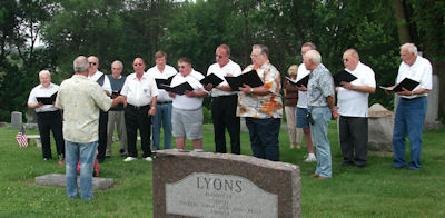 Singing at St Mary Lake MMC Members sing at Alois Schrenks grave.